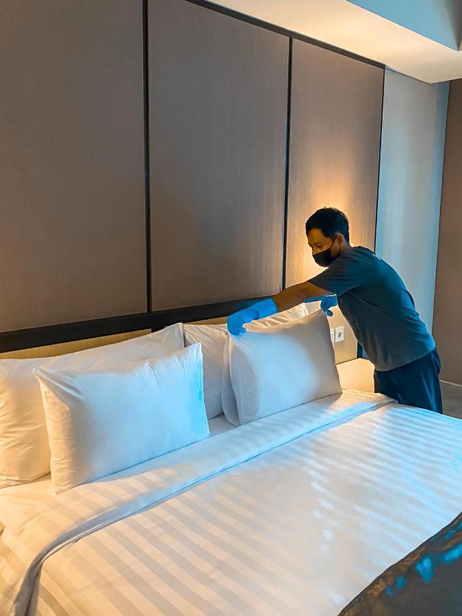 Bess Mansion Hotel Surabaya Wonotjolo エクステリア 写真