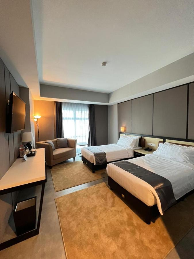 Bess Mansion Hotel Surabaya Wonotjolo エクステリア 写真